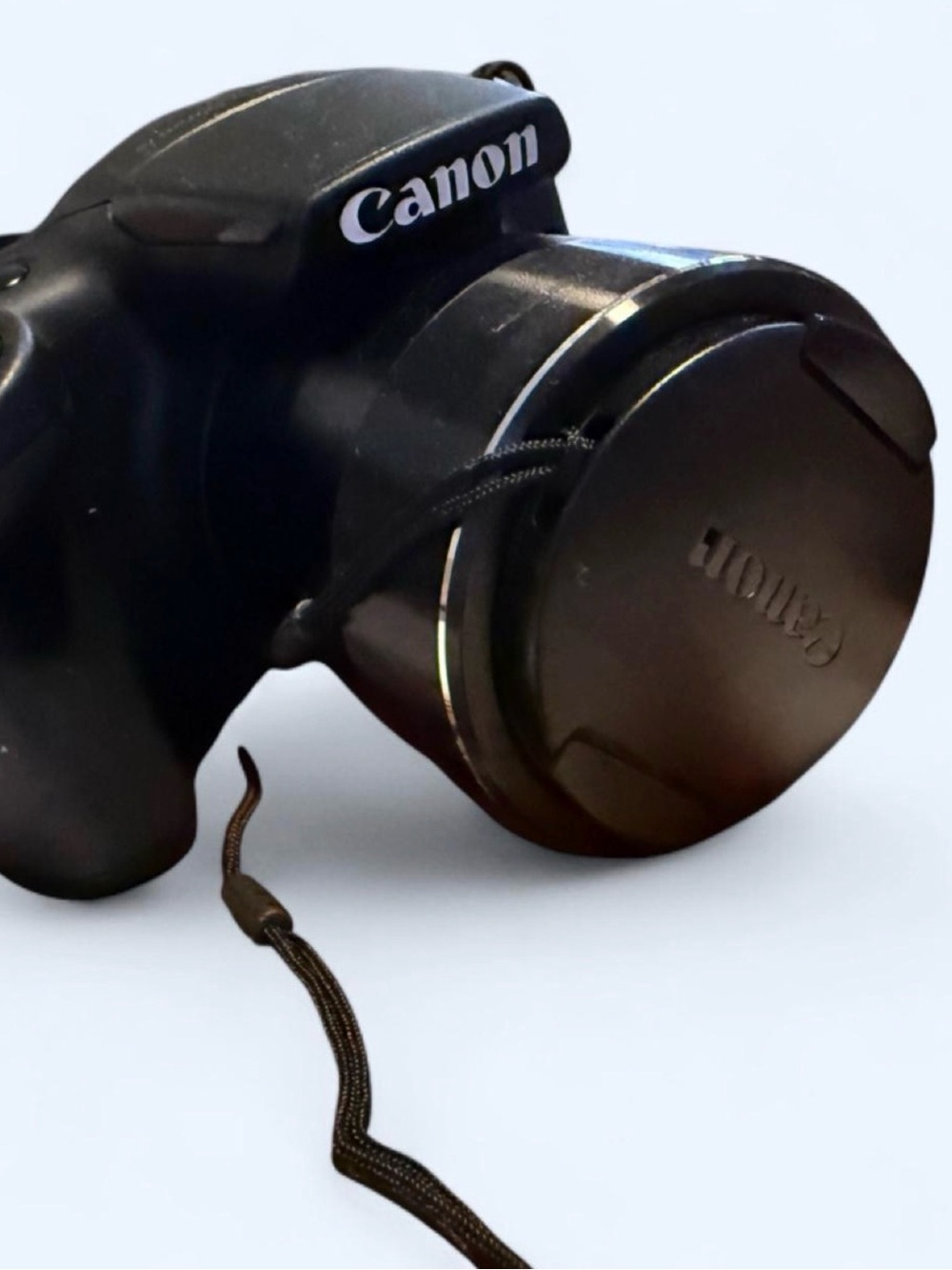 Canon PowerShot SX420 IS Digital Camera with Lens Cover, wrist wrap, and battery